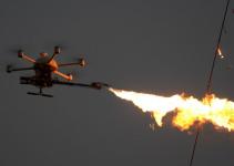 护航G20无人机显神通 30米高空遥控喷火清障 余杭区供电公司带电清除输电线路异物