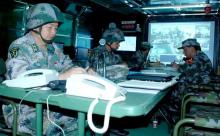 解放军推广新型指挥信息系统 无人机引导火力打击