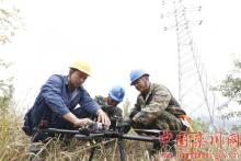 栾川县供电公司首次利用无人机架设线路
