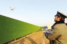 西安：无人机监管工地 违法问题实时回传