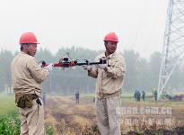 大丰供电：无人机载线成功