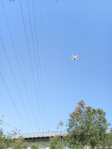 无人机+电子眼 儋州供电局“两会”期间输电线路巡查维护尽显科技风