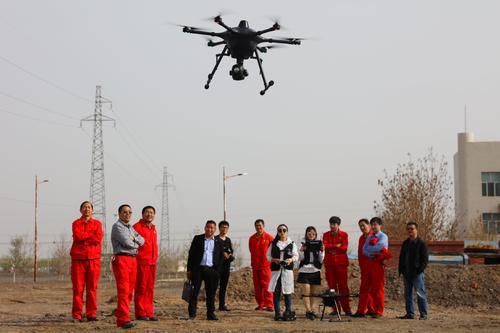 吐哈油田首次用无人机架设电缆