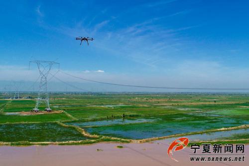 无人机跨越黄河放线，沙湖至上海庙750千伏线路6月底完工