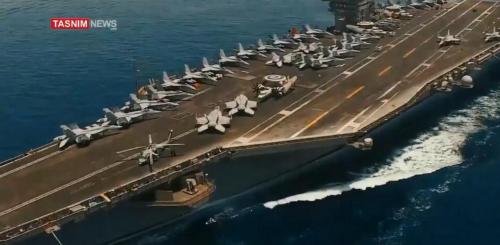 伊朗向美国亮出“王牌”，无人机低空掠过航母，战机编号清晰可见
