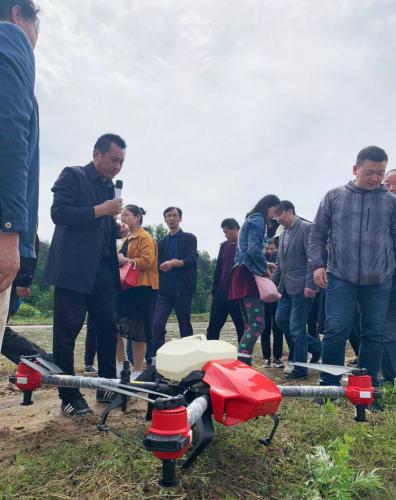 极飞智能播撒机在全国多地开展水稻直播作业演示