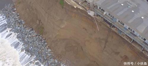 海景房超惊心 无人机拍到悬崖土块坍塌险象