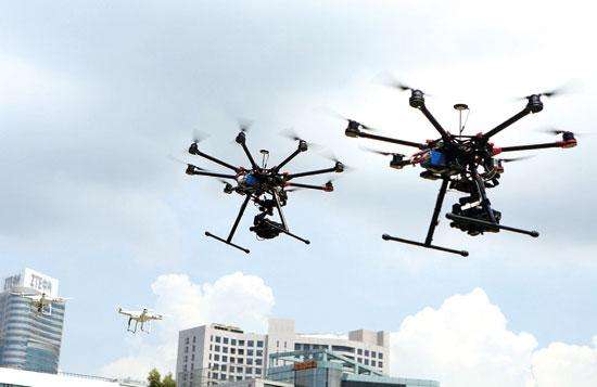 大亚湾治“两违“:无人机航拍“违建“ 扫码知房屋信息