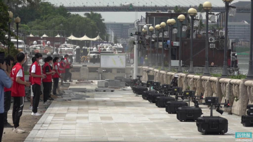 广州警方部署60架无人机，高空喊话劝市民戴好口罩